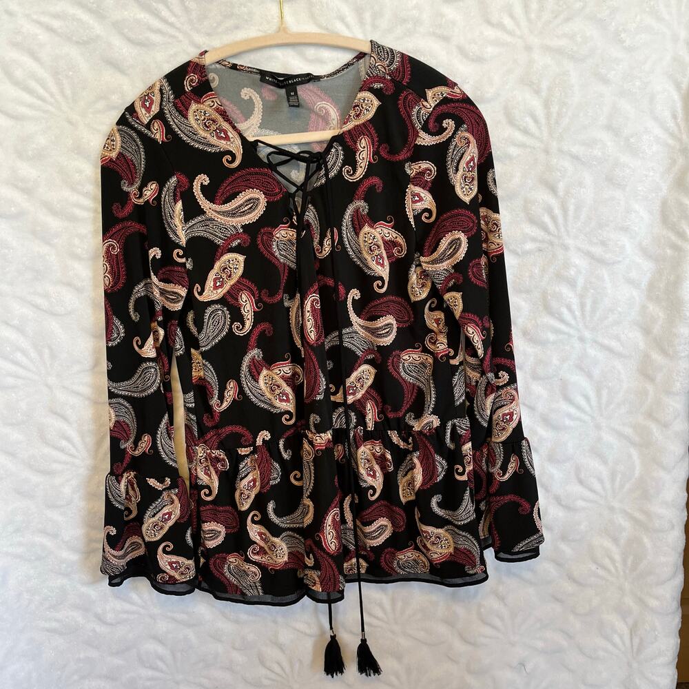 WHBM black paisley top with front tie tassel string flare sleeve and peplum